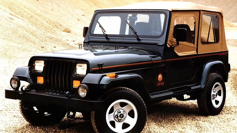 Jeep Wrangler Sahara Edition parked in a sandy location