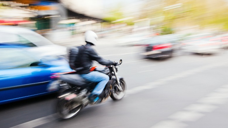 person lane-splitting