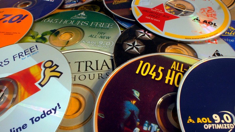 various AOL discs scattered on top of each other