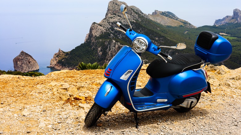 Vespa on a cliff