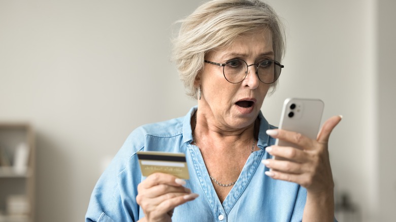 A woman making a payment