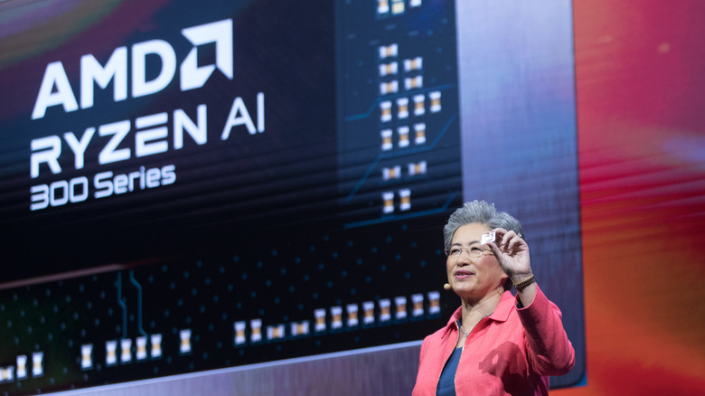 AMD chief Dr Lisa Su holding a Ryzen 300 series chip