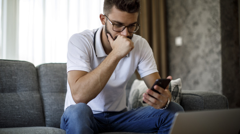 Man looking at his phone