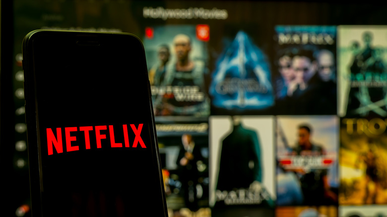 Netflix on phone and screen