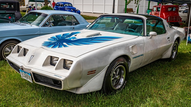 1979 white Trans Am with blue firebird