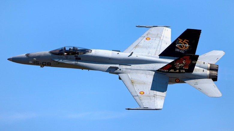 An F/A-18A flown by the Spanish Air Force flying over blue skies