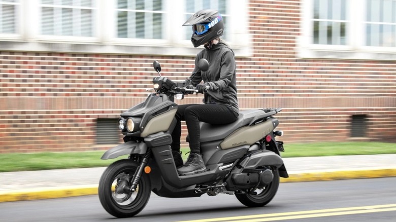 Person riding Yamaha Zuma 125