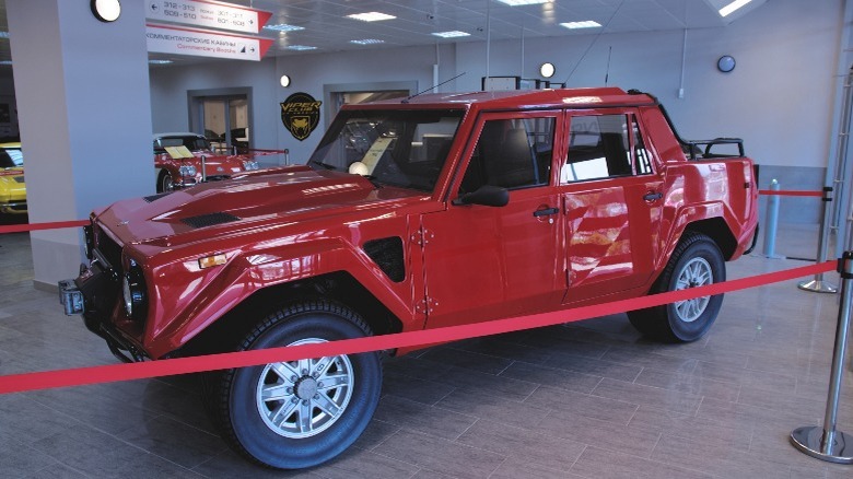 red Lamborghini LM 002 in a museum