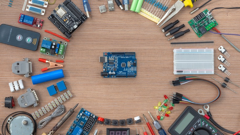 Arduino surrounded by hardware components