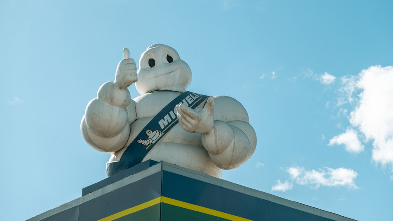 Michelin Man model on building roof