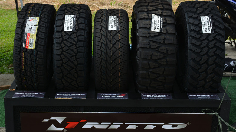 Various Nitto tire models on display