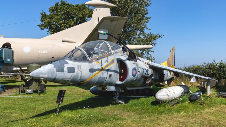 a Harrier Jump Jet parked on display in a museum