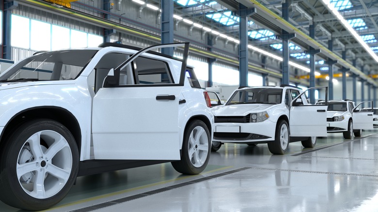 identical cars in an assembly plant