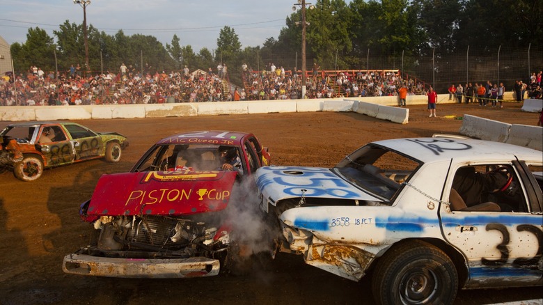 A Demolition Derby Car Using the Trunk To Disable An Opponents Engine During Collision