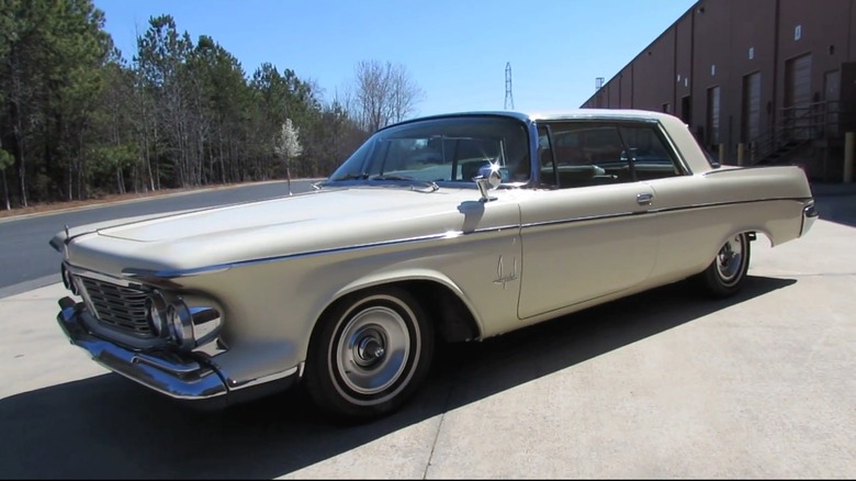 1963 Chrysler Imperial In Beige In A Parking Lot