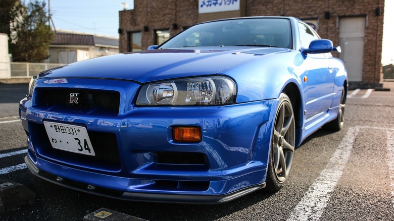 blue Nissan GT-R R34