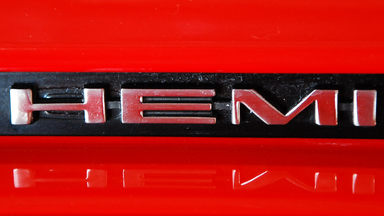 Chrome HEMI logo on a red and black background
