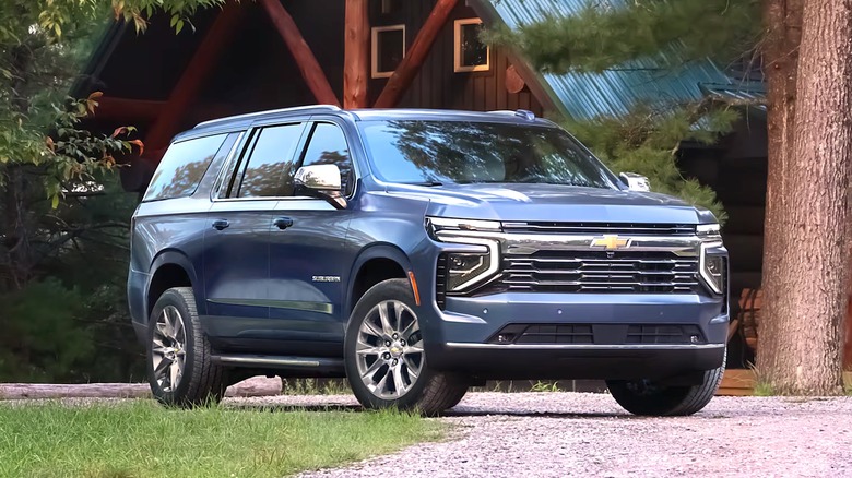 Chevy Suburban parked at beach