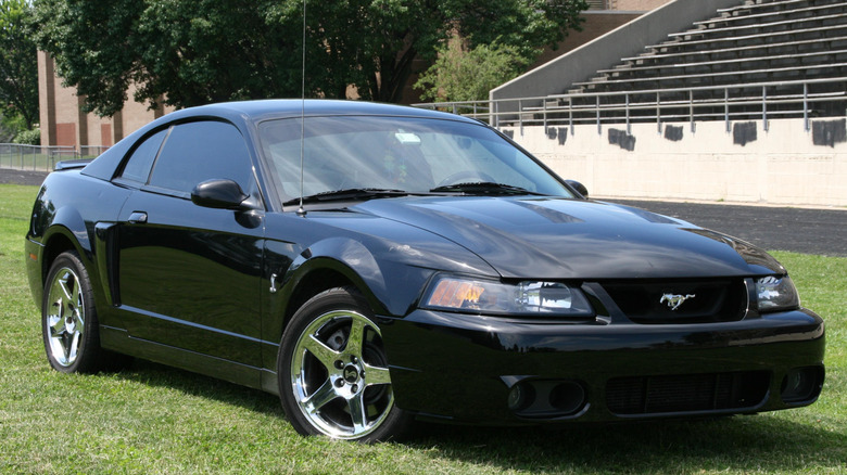 2004 Ford SVT Mustang Cobra parked on playing field