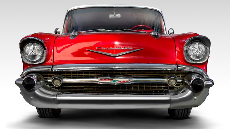 head on view of Red Chevy 57 on plain background