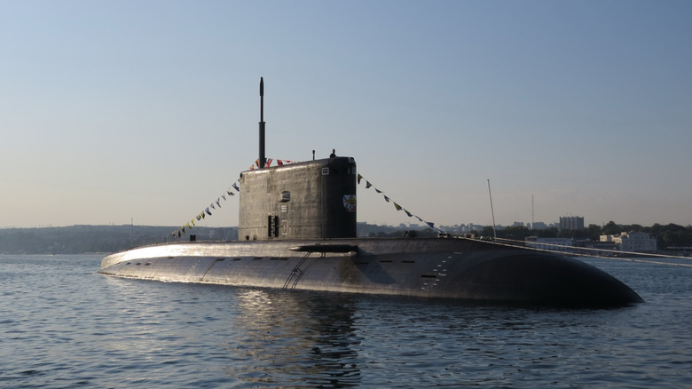 a surface submarine tied with ropes