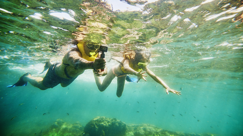 Divers snorkeling with GoPro