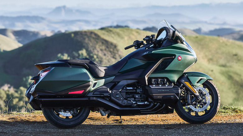 Green 2024 Honda Gold Wing DCT parked on dirt