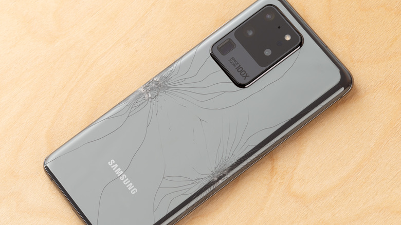 back of a cracked Samsung phone