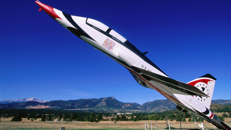 The U.S. Air Force Thunderbirds F-16 Fighting Falcon on display pointed toward the sky