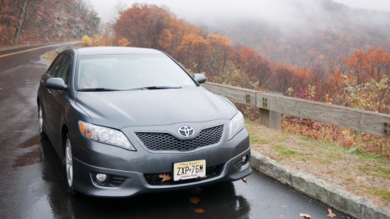 Frontal view of a Toyota Camera on a mountain road 