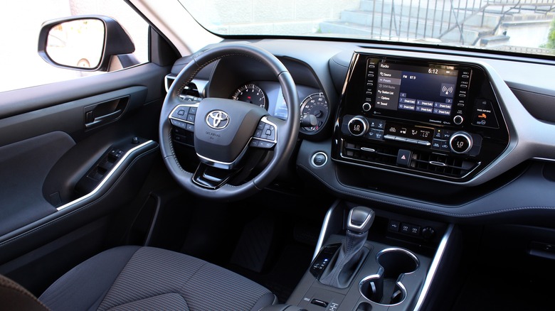 The interiors of a Toyota Highlander which comes with a JBL speaker system