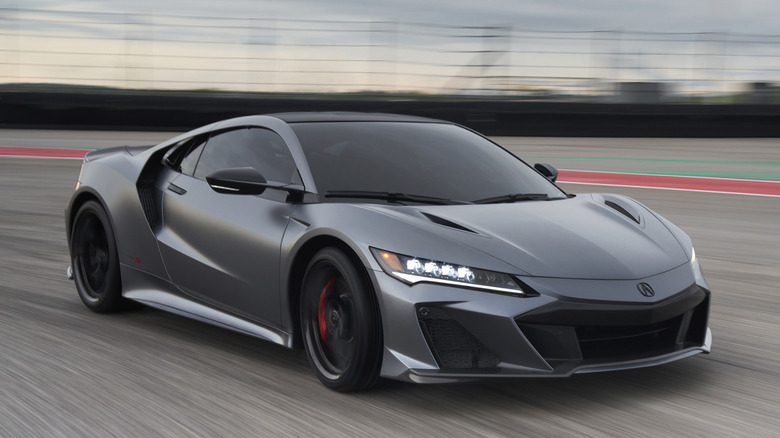 Front 3/4 view of grey 2022 Acura NSX