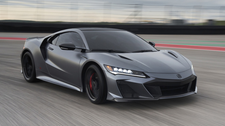 Front 3/4 view of grey 2022 Acura NSX