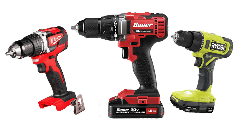 Milwaukee, Bauer, and Ryobi power drills lined up with white background