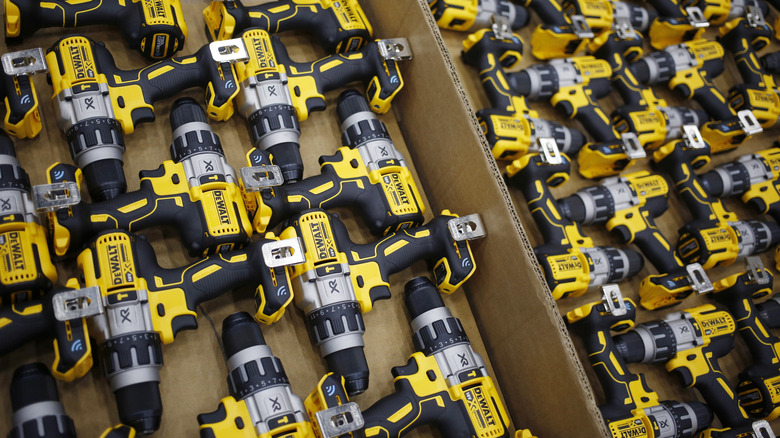 DeWalt power drills in cardboard box