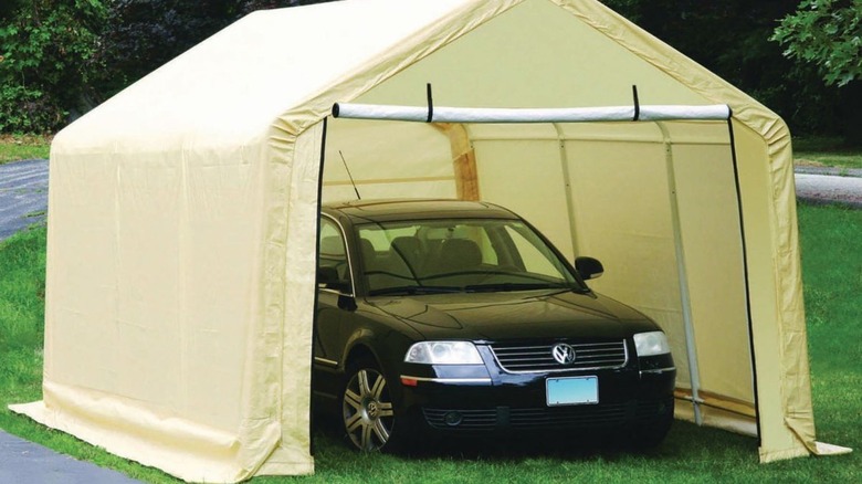 car under yellow portable carport