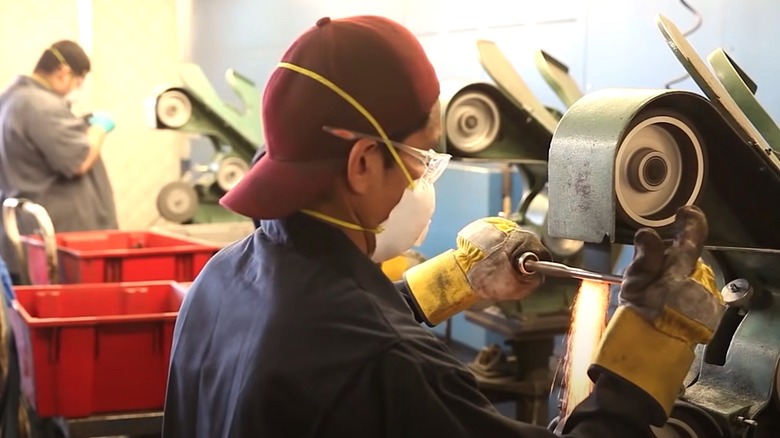 Worker making Matco Tools