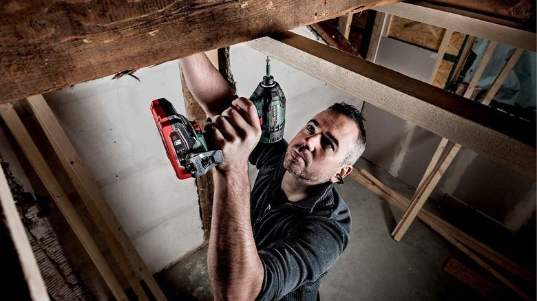 Man using Metabo cordless drill