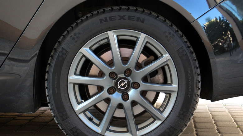 A OE Nexen tire attached to a car