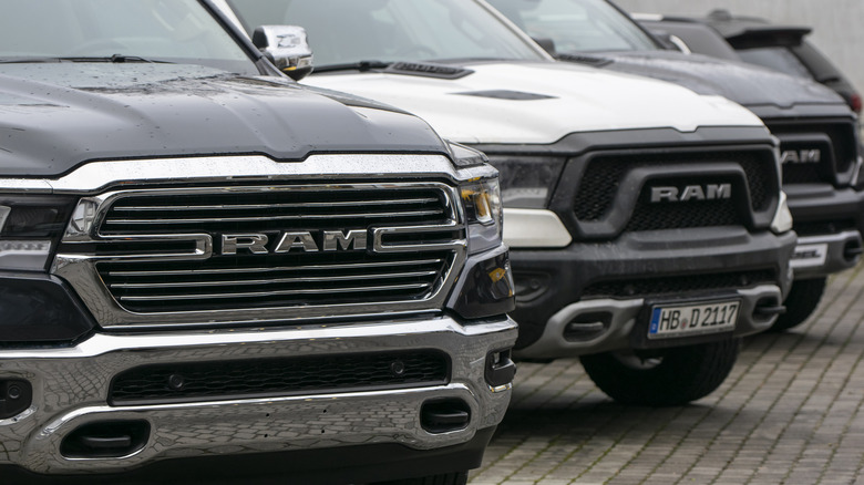 Several Ram pickup trucks parked side by side