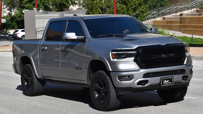 A Ram pickup truck cruising the road in broad daylight