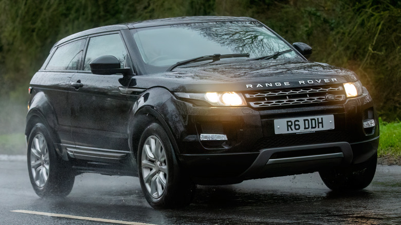 Range Rover driving in rain