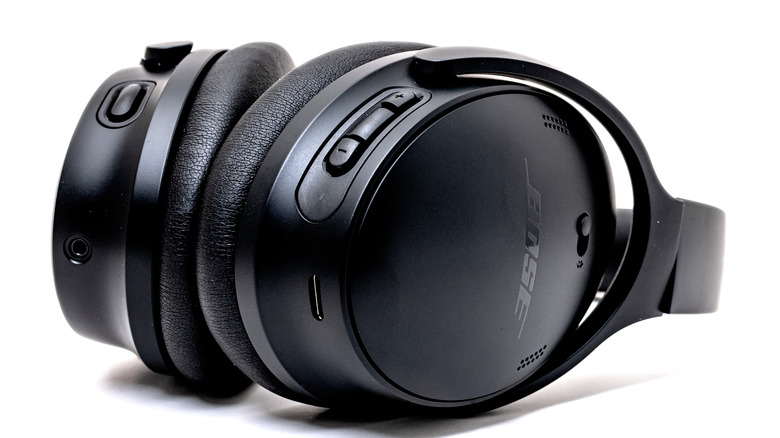 A pair of black wireless Bose headphones.