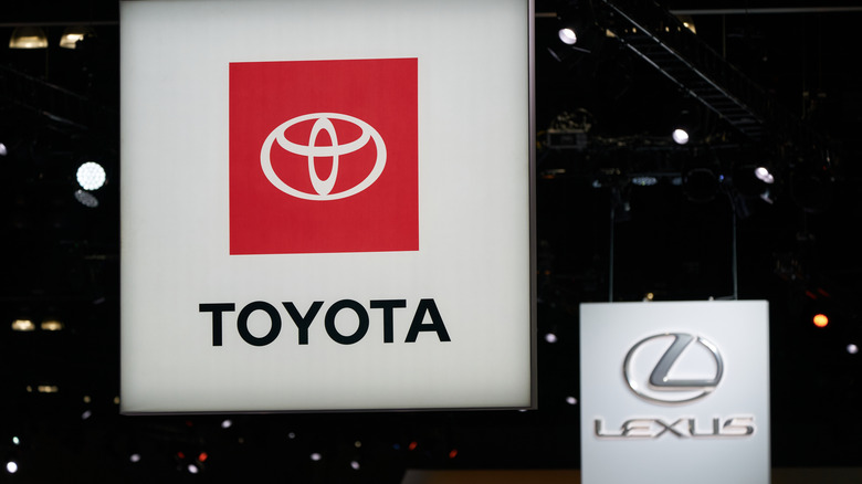 Toyota and Lexus signs next to each other