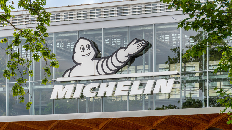 Michelin logo and mascot displayed outside of a building