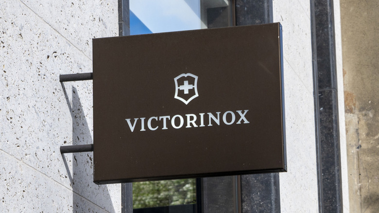 A Victorinox sign outside of a building.