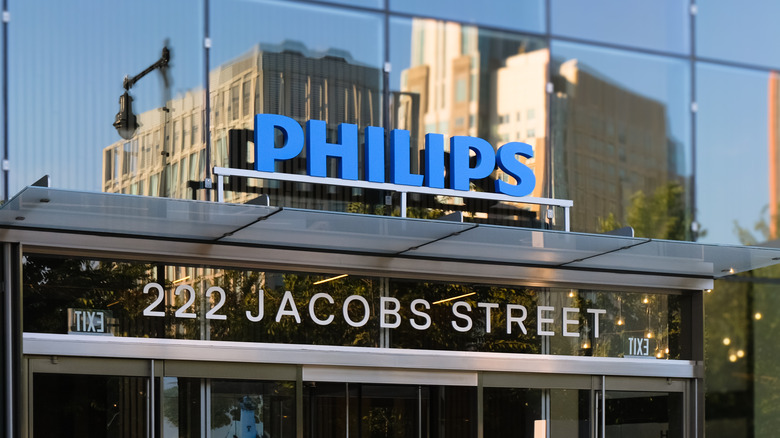 The Philips logo on top of a corporate building entrance