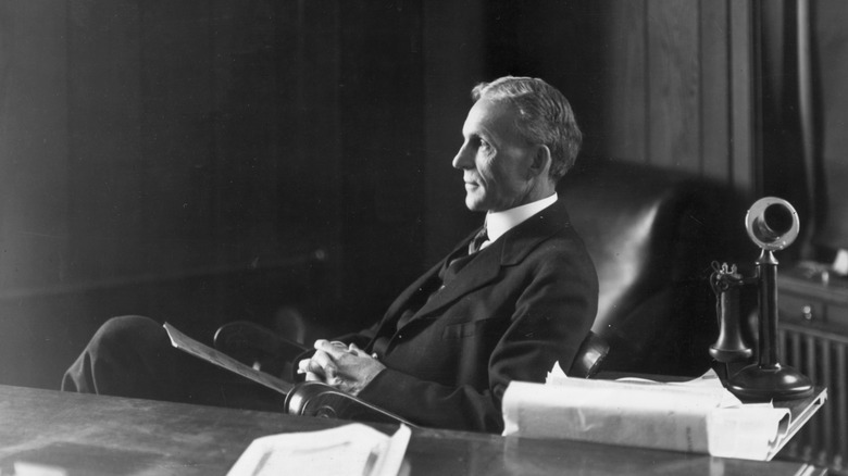 Henry Ford thinking at his desk