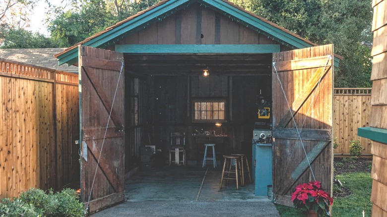 The garage in Palo Alto where Hewlett-Packard first started. The doors are open and workshop equipment is visible.