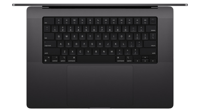 Apple's new 14-inch MacBook Pro laptop shown from the top, with a focus on its keyboard.